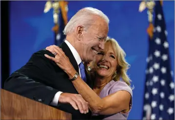  ??  ?? Biden with wife Jill; the two married after the death of Joe’s first wife, Neilia, and daughter in a crash.