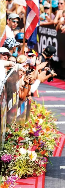  ??  ?? OPPOSITE
Matt Russell at the Ironman World Championsh­ip in Kona, 2019