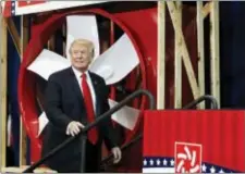  ?? ALEX BRANDON — THE ASSOCIATED PRESS ?? President Donald Trump arrives to speak about tax reform, Wednesday at the Loren Cook Company in Springfiel­d, Mo.