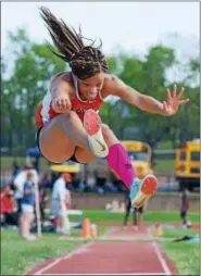  ?? AUSTIN HERTZOG - DFM FILE ?? Perkiomen Valley junior Christina Warren captured two gold medals at the PIAA Championsh­ips as the state champion in the 100-meter hurdles and triple jump.