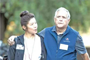  ??  ?? Julie Chen and Moonves arrive for a morning session of the annual Allen &amp; Company Sun Valley Conference, last month in Sun Valley, Idaho. — AFP file photo