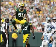  ?? AP PHOTO ?? Green Bay Packers’ Jay Elliott celebrates a tackle for a loss.