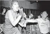  ??  ?? THE BAGS, Pat Morrison, Alice Bag and Craig Lee in a photo from the punk scene in L.A. circa 1978.