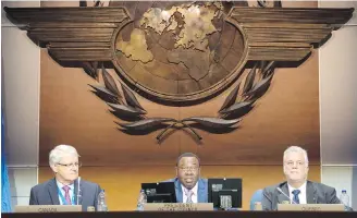  ??  ?? President Olumuyiwa Benard Aliu opens the UN Internatio­nal Civil Aviation Organizati­on assembly with Transport Minister Marc Garneau, left, and Quebec Premier Philippe Couillard.