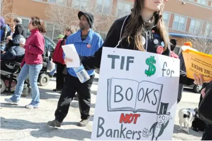  ?? SUN-TIMES FILES ?? Public anger over how tax increment financing is used is nothing new. This protest was held in 2011.