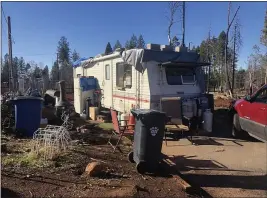  ?? PHOTOS BY NATALIE HANSON — ENTERPRISE-RECORD ?? A 26-foot trailer belonging to the Messners is seen Tuesday in Magalia. Preparing the lot Tuesday, they are eagerly awaiting a prefabrica­ted home to arrive from Oregon just after New Year’s Day.