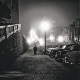  ?? Fred Lyon ?? A late 1950s photo by Fred Lyon shows a man walking down Mason Street on Nob Hill between California and Pine streets next to the Mark Hopkins Hotel.