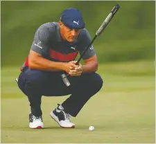  ?? SCOTT TAETSCH/USA TODAY SPORTS ?? Bryson DeChambeau lines up a putt on the third playoff hole at the BMW Championsh­ip. He missed a series of clutch putts in a loss to Patrick Cantlay.