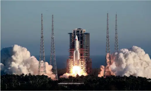  ?? AP ?? China’s new large carrier rocket Long March5B blasts off from the Wenchang Space Launch Center in southern China’s Hainan Province.