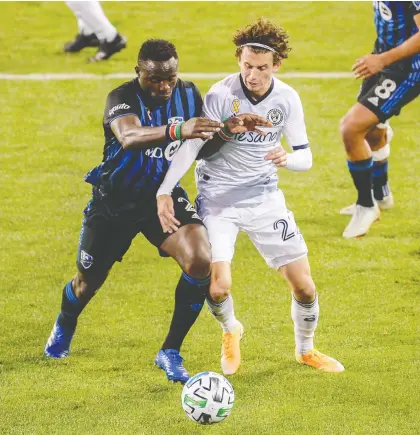  ?? DENNIS SCHNEIDLER-USA TODAY SPORTS ?? Montreal Impact defender Jukka Raitala battles for the ball during the match with Philadelph­ia Union Sunday.