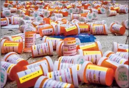  ?? ERIK MCGREGOR/ZUMA PRESS/TNS ?? New Centers for Disease Control and Prevention data published Wednesday suggest that a projected 100,306 individual­s died from drug overdoses over the 12-month period ending in April, a 28.5% increase over the previous 12-month period.