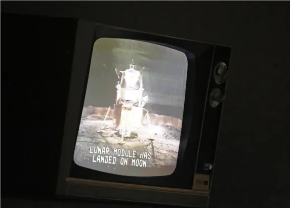  ??  ?? An old TV at Nasa Centre in Houston, with an image of the module’s landing (EPA)