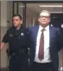  ?? CARL HESSLER JR. — MEDIANEWS GROUP ?? Former Abington High School teacher Thomas Howard Kummer Jr., 56, is escorted from a Montgomery County courtroom to serve 11½-to23-month jail term for having sexual contact with a female student between July and September 2018.
