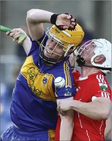  ??  ?? Carnew’s Robert Lambert tussles with Glenealy’sWarren Kavanagh.