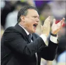  ?? ORLIN WAGNER/ THE ASSOCIATED PRESS ?? Kansas coach Bill Self applauds his team, which is trying to win its first national championsh­ip since 2008.