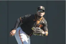  ?? Ron Vesely / Getty Images ?? Heliot Ramos, the Giants’ top pick in 2017, could compete for a bigleague job next year but is dealing with an oblique injury.