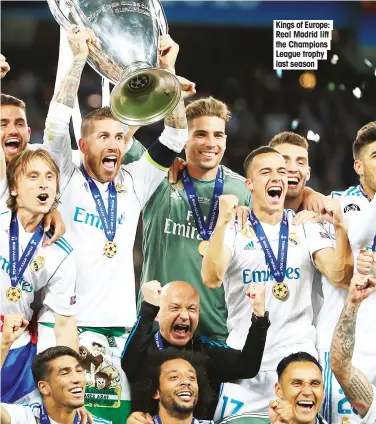  ??  ?? Kings of Europe: Real Madrid lift the Champions League trophy last season