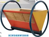  ??  ?? KINDERWIEG­E 1923 schuf Peter Keler diese Wiege in den Farben gelb, rot und blau.