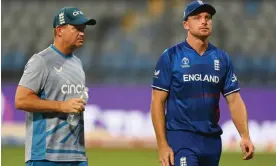  ?? Gareth Copley/Getty Images ?? Matthew Mott, left, and Jos Buttler look downcast after the defeat to South Africa. Photograph: