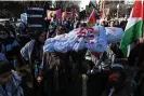  ?? Widak/NurPhoto/Rex/Shuttersto­ck ?? People gather at at ‘Hands off Rafah’ rally in Edmonton, Canada. Photograph: Artur