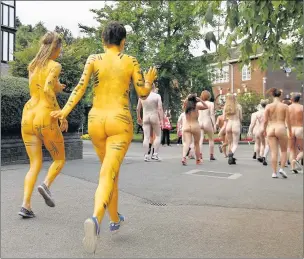  ??  ?? n LEG IT: Around 300 participan­ts take part in Streak for Tigers in order to raise money for Sumatran tigers at ZSL London Zoo. Above left, Sumatran tiger Melati
Photos by Tony Bates and Johnny Green