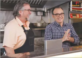  ?? Photos contribute­d ?? Left: Chef Rod Butter and host John Catucci of Big Food Bucket List.
Kelowna restaurant Sunny’s a modern diner will be featured on the Food Network show on Saturday.