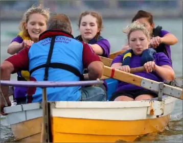  ??  ?? Members of Wexford’s Troll Rowing Club on the water.