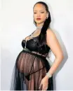  ?? ?? RIHANNA shows off her belly in a sheer dress. | Instagram