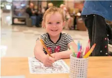  ??  ?? Lilly Smith enjoys school holiday activities at Grand Central.