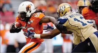  ??  ?? Lions linebacker Solomon Elimimian heads up field after intercepti­ng a pass intended for Bombers receiver Chris Matthews during the first half at B.C. Place on Monday.