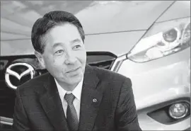  ?? Al Seib
Los Angeles Times ?? “BECAUSE WE are a small-scale company, we are able to focus on clearly identifyin­g our brand,” Mazda Chief Executive Masamichi Kogai says.