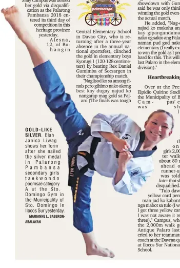  ?? MARIANNE L. SABERONABA­LAYAN ?? GOLD-LIKE SILVER. Elah Janica Liwag shows her form after she nailed the silver medal in Palarong Pambansa secondary girls taekwondo poomsae category A at the Sto. Domingo Gym in the Municipali­ty of Sto. Domingo in Ilocos Sur yesterday.