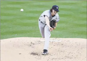  ?? Rob Carr / Getty Images ?? Gerrit Cole, No. 45 of the New York Yankees, throws a pitch against the Washington Nationals during the first inning in the game at Nationals Park on Thursday in Washington, D.C.