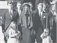 ?? ?? ↑ Family at the funeral of assassinat­ed president John F Kennedy in Washington DC on this day in 1963