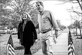  ?? PHIL LONG/AP ?? Sen. Sherrod Brown, D-Ohio, and his wife, Connie Schultz, walk to their polling station to vote. Brown rode his blue-collar appeal to re-election in a state Trump carried in 2016.