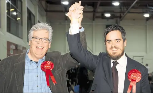  ?? Picture: Paul Amos ?? Cllr Alex Ward celebrates his election to Ashford Borough Council with proud dad David last May