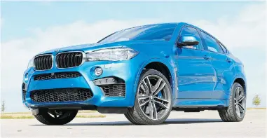  ?? GRAEME FLETCHER/[POSTMEDIA NEWS ?? The 2015 BMW X6 M is a very different drive but is still a comfortabl­y flexible crossover that is faster than it appears.
