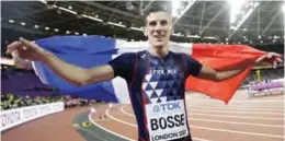  ??  ?? LONDON: France’s Pierre-Ambroise Bosse celebrates after winning the gold medal in the men’s 800-meter final during the World Athletics Championsh­ips in London Tuesday. — AP