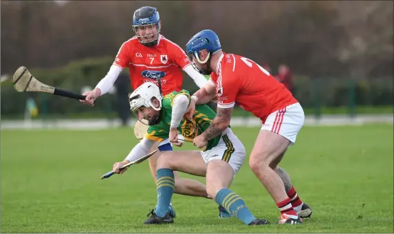  ??  ?? Lixnaw’s Shane McElligott looks to get away under pressure from Darren Butler, Charlevill­e, during the Munster Club IHC semi-final played before a packed Hermitage Park, Lixnaw crowd last Saturday. Photo by Domnick Walsh