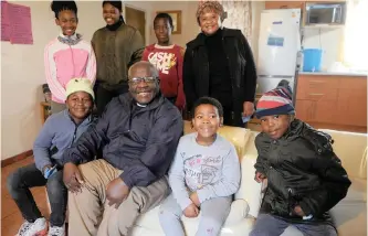  ?? | BRENDAN MAGAAR African News Agency (ANA) ?? REVERENDS Yvonne Daki and Thozamile Toni surrounded by kids from the community. Toni opens his home to children where he teaches them bible studies and life skills. They get at least three meals a day.