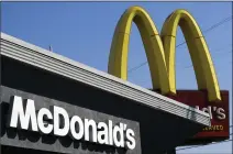  ?? RICHARD VOGEL — THE ASSOCIATED PRESS ?? McDonald’s says it will be hiring part-time and full-time employees with a drive-up hiring day set for Tuesday.