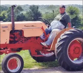  ?? Contribute­d photo ?? Rudy Hudak on his tractor. Hudak, who died in December 2020, lived on his family farm in Shelton his entire life.