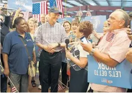  ?? JIM RASSOL/STAFF PHOTOGRAPH­ER ?? Gov. Rick Scott took his U.S. Senate campaign message to South Florida Thursday, holding a “Let’s Get to Work” rally at Baron Signs Manufactur­ing in Riviera Beach.