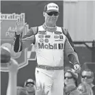  ?? AP ?? Kevin Harvick greets fans before a NASCAR Cup Series race last year at Richmond Raceway.