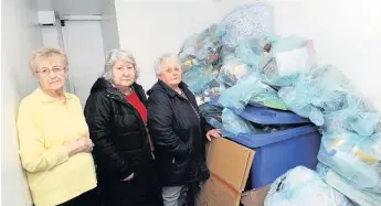  ??  ?? What a tip Neighbours, from left, Mary Wilson, Gwen Ross and Vivien Bradley want action