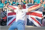  ?? USA TODAY SPORTS ?? Lewis Hamilton celebrates his sixth world championsh­ip last year.