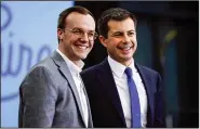  ?? (AP file/Matt Rourke) ?? Chasten (left) and Pete Buttigieg smile to the crowd at a 2020 campaign event. The couple, and their unique situation, are profiled in “Mayor Pete,” now streaming on Amazon Prime.