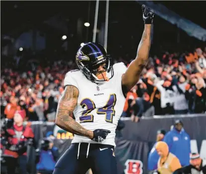  ?? JEFF DEAN/AP ?? Ravens cornerback Marcus Peters reacts after breaking up a pass during a wild-card playoff game against the Bengals on Jan. 16 in Cincinnati.