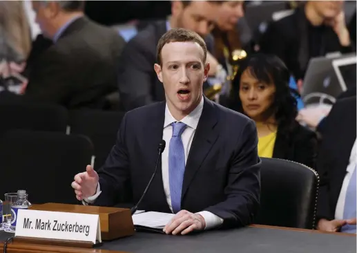  ?? (Olivier Douliery/Abaca Press/TNS) ?? FACEBOOK CEO Mark Zuckerberg testifies before the Senate judiciary and commerce committees on Tuesday in Washington over social-media data breaches.