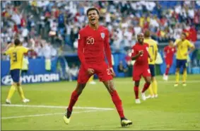  ?? MATTHIAS SCHRADER - THE ASSOCIATED PRESS ?? England’s Dele Alli celebrates after scoring his side’s second goal during the quarterfin­al match between Sweden and England at the 2018soccer World Cup in the Samara Arena, in Samara, Russia, Saturday, July 7, 2018.